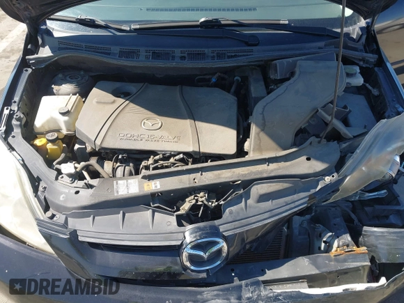 2006 Mazda 5 Sport with VIN JM1CR29L560126780, listed as a IAAI auction lot 41653391 with 112,547 mi miles and . Bid and sale history available at DreamBid. Image 10.