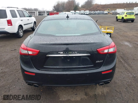 2017 Maserati Ghibli with VIN ZAM57XSA3H1197716, listed as a IAAI auction lot 41918916 with 47,779 mi miles. Bid and sale history available at carsss.com. Image 16.