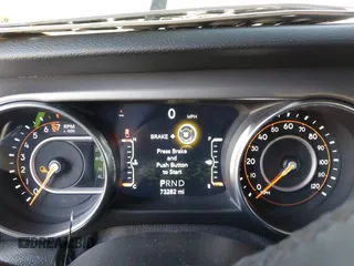 2020 Jeep Gladiator Sport S z VIN 1C6HJTAG7LL154664, wystawiony jako IAAI lot #42033131 z przebiegiem 73 282 mil mil oraz . Historia ofert i sprzedaży dostępna na DreamBid. Obrazek 7.