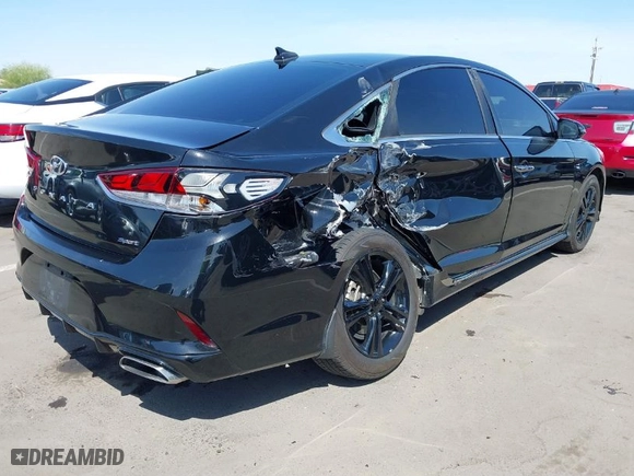 2019 Hyundai Sonata Sport with VIN 5NPE34AF2KH792374, listed as a IAAI auction lot 41987740 with 77,209 mi miles. Bid and sale history available at carsss.com. Image 4.