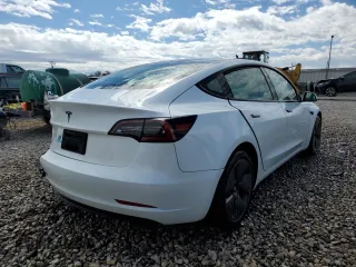 2023 Tesla Model 3 with VIN 5YJ3E1EA9PF569835, listed as a Copart auction lot 50876824 with 25,736 mi miles and Salvage Title. Bid and sale history available at DreamBid. Image 3.