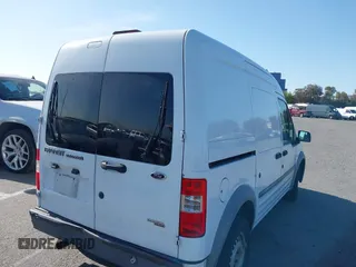 2013 Ford Transit Connect XL z VIN NM0LS7CN5DT172095, wystawiony jako IAAI lot #41979833 z przebiegiem 155 044 mil mil oraz . Historia ofert i sprzedaży dostępna na DreamBid. Obrazek 4.