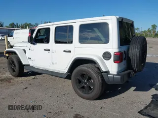 2020 Jeep Wrangler Unlimited Sahara High Altitude with VIN 1C4HJXEG7LW259911, listed as a IAAI auction lot 41786013 with 47,936 mi miles and . Bid and sale history available at DreamBid. Image 3.