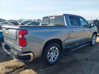 2024 Chevrolet Silverado 1500 LTZ with VIN 1GCUDGE84RZ309881, listed as a IAAI auction lot 41837654 with 8,873 mi miles and . Bid and sale history available at DreamBid. Image 4.