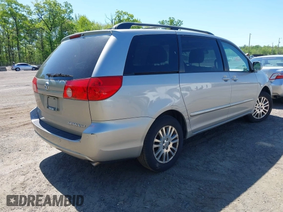 2010 Toyota Sienna XLE with VIN 5TDYK4CC3AS316002, listed as a IAAI auction lot 42138246 with 123,203 mi miles. Bid and sale history available at carsss.com. Image 4.
