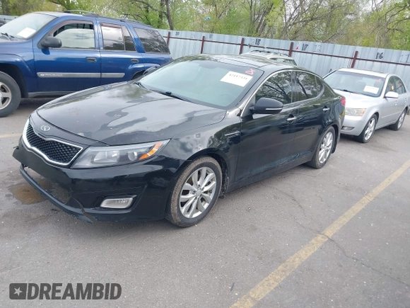 2014 Kia Optima EX with VIN 5XXGN4A7XEG300394, listed as a IAAI auction lot 42117331 with 139,986 mi miles and . Bid and sale history available at carsss.com. Image 2.