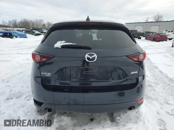 2019 Mazda CX-5 Touring with VIN JM3KFBCM0K0607933, listed as a Copart auction lot 46260815 with 64,349 mi miles and Salvage Title. Bid and sale history available at carsss.com. Image 6.