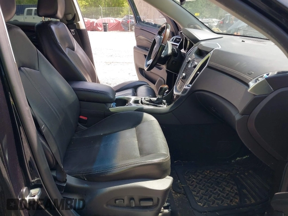 2012 Cadillac SRX Performance Collection with VIN 3GYFNEE32CS512118, listed as a IAAI auction lot 42158452 with 143,449 mi miles. Bid and sale history available at carsss.com. Image 5.