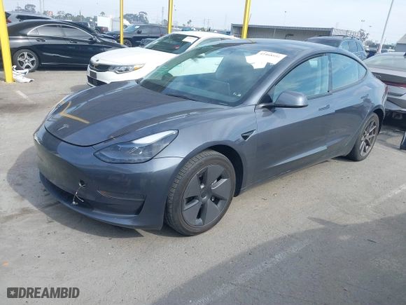 2023 Tesla Model 3 with VIN 5YJ3E1EA0PF577869, listed as a IAAI auction lot 41468956 with 38,760 mi miles. Bid and sale history available at carsss.com. Image 17.