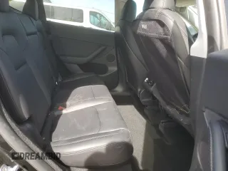 2024 Tesla Model Y Long Range z VIN 7SAYGDEE1RF985095, wystawiony jako Copart lot #55155635 z przebiegiem 17 007 mil mil oraz Szkody całkowita. Historia ofert i sprzedaży dostępna na DreamBid. Obrazek 10.