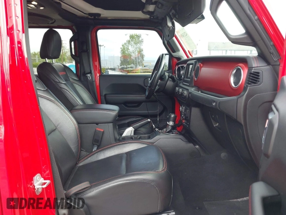 2021 Jeep Gladiator Rubicon with VIN 1C6JJTBGXML572976, listed as a IAAI auction lot 42134909 with 35,612 mi miles and . Bid and sale history available at DreamBid. Image 5.