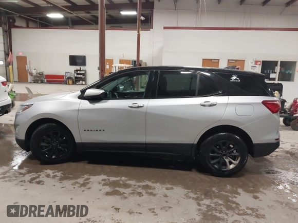 2018 Chevrolet Equinox LT z VIN 2GNAXSEV6J6198809, wystawiony jako IAAI lot #41945758 z przebiegiem 196 485 mil mil oraz . Historia ofert i sprzedaży dostępna na DreamBid. Obrazek 15.