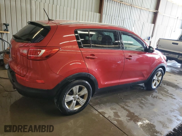 2012 Kia Sportage LX with VIN KNDPBCA2XC7221238, listed as a Copart auction lot 53683495 with 217,313 mi miles and Salvage Title. Bid and sale history available at DreamBid. Image 3.