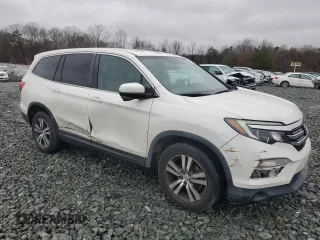 2016 Honda Pilot EX-L with VIN 5FNYF6H59GB054462, listed as a Copart auction lot 44717105 with 95,716 mi miles and Salvage Title. Bid and sale history available at carsss.com. Image 4.