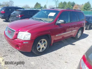 2002 GMC Envoy SLT with VIN 1GKDS13S922205147, listed as a IAAI auction lot 42041118 with 127,400 mi miles. Bid and sale history available at carsss.com. Image 2.
