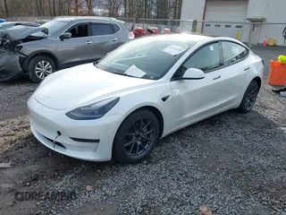 2023 Tesla Model 3 z VIN 5YJ3E1EAXPF543227, wystawiony jako IAAI lot #41150158 z przebiegiem 19 782 mil mil oraz . Historia ofert i sprzedaży dostępna na DreamBid. Obrazek 2.