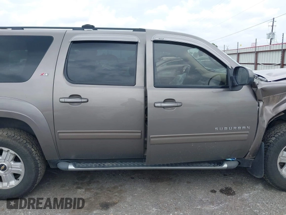 2012 Chevrolet Suburban LT with VIN 1GNSKJE78CR131456, listed as a IAAI auction lot 42152241 with 215,790 mi miles and . Bid and sale history available at DreamBid. Image 13.