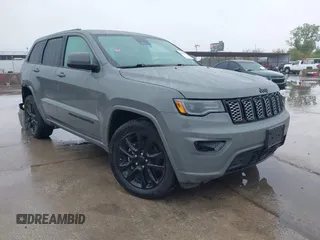 2020 Jeep Grand Cherokee Altitude with VIN 1C4RJEAG8LC171448, listed as a IAAI auction lot 40991493 with 61,509 mi miles and . Bid and sale history available at DreamBid. Image 1.