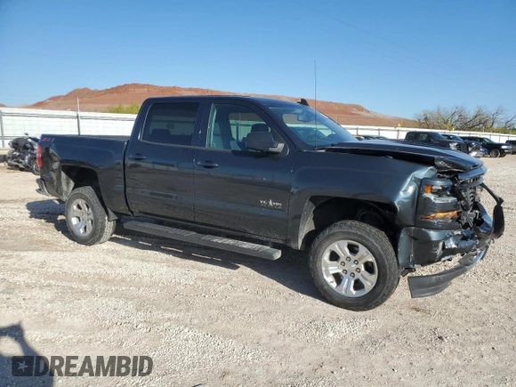 2018 Chevrolet Silverado 1500 LT with VIN 3GCUKRECXJG283331, listed as a Copart auction lot 52102345 with 69,603 mi miles and Salvage Title. Bid and sale history available at DreamBid. Image 4.