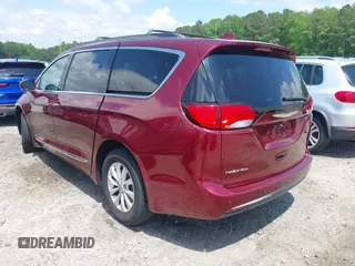 2017 Chrysler Pacifica Touring L with VIN 2C4RC1BG0HR591124, listed as a IAAI auction lot 42138595 with 113,071 mi miles and . Bid and sale history available at DreamBid. Image 3.