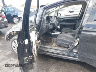 2016 Honda Fit LX with VIN JHMGK5H53GX012374, listed as a IAAI auction lot 41760754 with 146,836 mi miles. Bid and sale history available at carsss.com. Image 5.