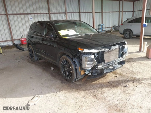 2019 Hyundai Santa Fe SE with VIN 5NMS23AD1KH112931, listed as a IAAI auction lot 41678592 with 96,477 mi miles. Bid and sale history available at carsss.com. Image 1.