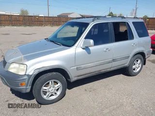 1999 Honda CR-V EX with VIN JHLRD1860XC056641, listed as a IAAI auction lot 42018329 with 321,707 mi miles. Bid and sale history available at carsss.com. Image 2.