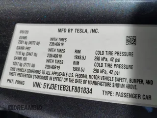 2020 Tesla Model 3 Long Range with VIN 5YJ3E1EB3LF801834, listed as a IAAI auction lot 42015079 with 47,793 mi miles. Bid and sale history available at carsss.com. Image 9.