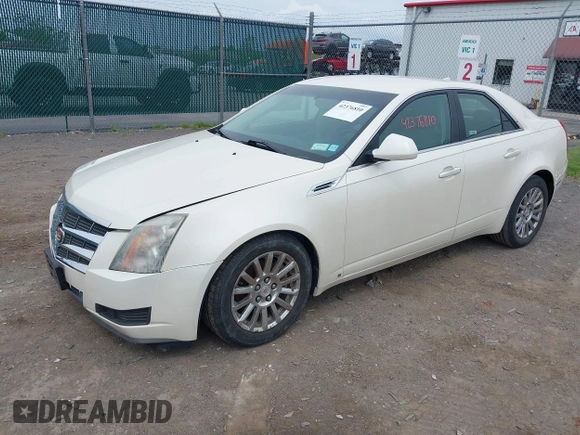 2009 Cadillac CTS RWD with VIN 1G6DF577290173180, listed as a IAAI auction lot 42376810 with 135,111 mi miles and . Bid and sale history available at DreamBid. Image 2.