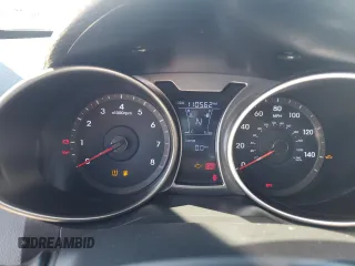 2012 Hyundai Veloster w/Black Int с VIN KMHTC6ADXCU072938, выставлен на аукционе Copart как лот 56767105 с пробегом 110 562 миль миль и Чистый • Clean title. История ставок и продаж доступна на DreamBid. Изображение 9.