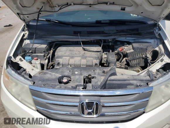 2013 Honda Odyssey Touring with VIN 5FNRL5H99DB052538, listed as a Copart auction lot 66310875 with 192,052 mi miles and Clean title. Bid and sale history available at DreamBid. Image 12.