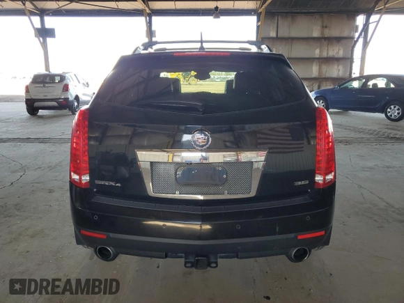 2012 Cadillac SRX Premium Collection z VIN 3GYFNFE30CS599863, wystawiony jako Copart lot #61249995 z przebiegiem 144 740 mil mil oraz Czysty tytuł • Clean title. Historia ofert i sprzedaży dostępna na DreamBid. Obrazek 6.
