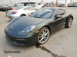 2018 Porsche 718 Cayman z VIN WP0AA2A89JK261618, wystawiony jako Copart lot #87911435 z przebiegiem 35 609 mil mil oraz Szkoda całkowita • Salvage title. Historia ofert i sprzedaży dostępna na DreamBid. Obrazek 1.