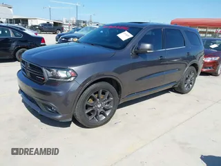 2017 Dodge Durango R/T with VIN 1C4SDJCT7HC678926, listed as a IAAI auction lot 42030357 with 142,084 mi miles and . Bid and sale history available at carsss.com. Image 2.