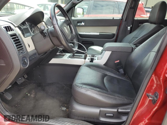 2010 Mercury Mariner with VIN 4M2CN9B7XAKJ24158, listed as a Copart auction lot 56522714 with 174,474 mi miles and Salvage title. Bid and sale history available at DreamBid. Image 7.