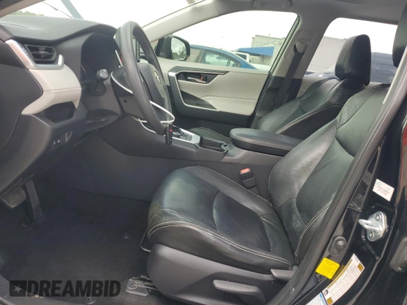 2019 Toyota RAV4 Hybrid XLE with VIN JTMRWRFV3KD020929, listed as a Copart auction lot 51827345 with 79,991 mi miles and Non Repairable. Bid and sale history available at carsss.com. Image 7.