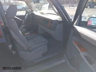 2007 Jeep Commander Sport with VIN 1J8HG48K97C566185, listed as a IAAI auction lot 41519140 with 127,230 mi miles. Bid and sale history available at carsss.com. Image 5.