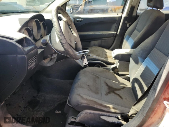 2009 Dodge Caliber SXT with VIN 1B3HB48A39D100358, listed as a Copart auction lot 51497775 with Not Provided miles and Salvage Title. Bid and sale history available at carsss.com. Image 7.