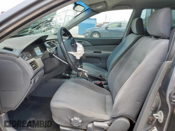 2006 Mitsubishi Lancer ES z VIN JA3AJ26EX6U067642, wystawiony jako Copart lot #56035945 z przebiegiem 163 060 mil mil oraz Szkoda całkowita • Salvage title. Historia ofert i sprzedaży dostępna na DreamBid. Obrazek 7.