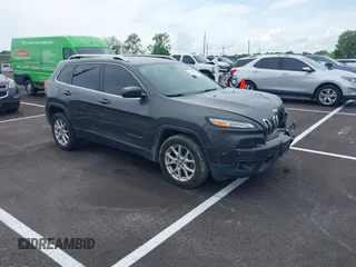 2015 Jeep Cherokee Latitude with VIN 1C4PJLCB5FW689811, listed as a IAAI auction lot 42113567 with 113,740 mi miles and . Bid and sale history available at carsss.com. Image 1.