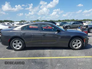 2023 Dodge Charger SXT with VIN 2C3CDXBG0PH571518, listed as a IAAI auction lot 42026774 with 47,394 mi miles and . Bid and sale history available at DreamBid. Image 13.
