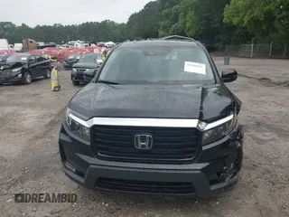 2023 Honda Ridgeline RTL-E with VIN 5FPYK3F77PB052828, listed as a IAAI auction lot 42366947 with 24,658 mi miles and . Bid and sale history available at DreamBid. Image 12.