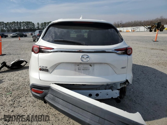 2016 Mazda CX-9 Touring with VIN JM3TCACY5G0100687, listed as a Copart auction lot 47082605 with 42,311 mi miles and Salvage Title. Bid and sale history available at DreamBid. Image 6.