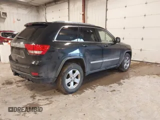 2012 Jeep Grand Cherokee Laredo with VIN 1C4RJFAT1CC225479, listed as a IAAI auction lot 41709911 with 227,150 mi miles. Bid and sale history available at carsss.com. Image 4.