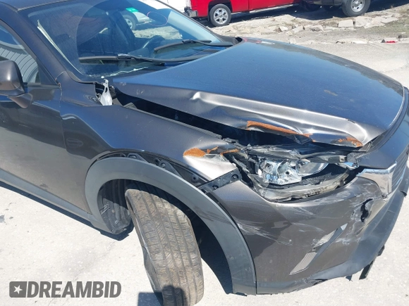 2016 Mazda CX-3 Touring with VIN JM1DKBC7XG0114940, listed as a IAAI auction lot 41777630 with 71,275 mi miles and . Bid and sale history available at DreamBid. Image 17.