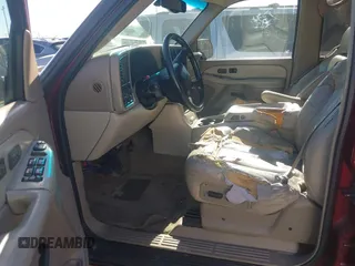 2002 Chevrolet Suburban LT with VIN 1GNEC16Z02J229078, listed as a IAAI auction lot 41737482 with 306,502 mi miles and . Bid and sale history available at DreamBid. Image 5.