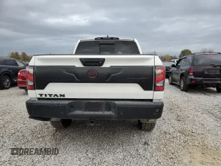 2023 Nissan Titan SV z VIN 1N6AA1ED7PN116504, wystawiony jako Copart lot #77986734 z przebiegiem 31 392 mil mil oraz Szkoda całkowita • Salvage title. Historia ofert i sprzedaży dostępna na DreamBid. Obrazek 6.