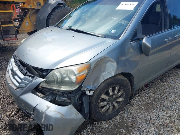 2010 Honda Odyssey EX with VIN 5FNRL3H4XAB015955, listed as a IAAI auction lot 42590535 with Not provided miles and . Bid and sale history available at DreamBid. Image 6.
