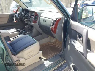 2003 Mitsubishi Montero Limited z VIN JA4NW51S03J040380, wystawiony jako IAAI lot #42144872 z przebiegiem 220 017 mil mil oraz . Historia ofert i sprzedaży dostępna na DreamBid. Obrazek 5.