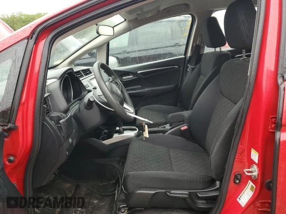 2015 Honda Fit LX с VIN 3HGGK5H5XFM779310, выставлен на аукционе Copart как лот 61281995 с пробегом 76 886 миль миль и Чистый • Clean title. История ставок и продаж доступна на DreamBid. Изображение 7.